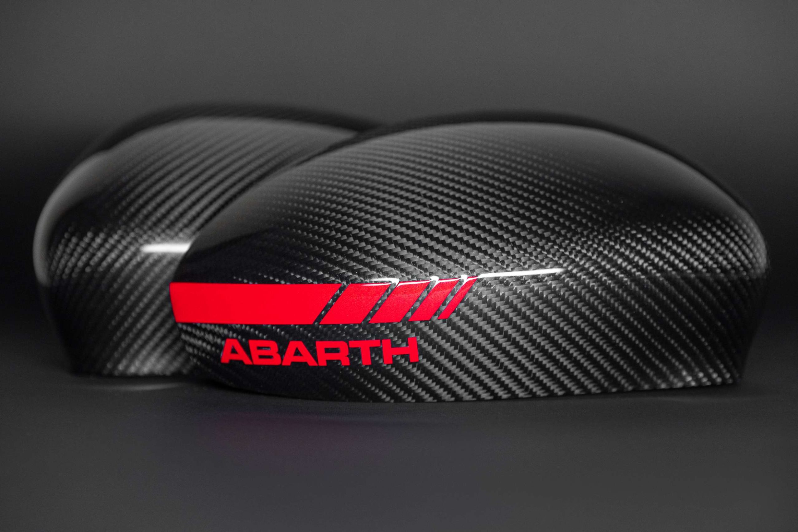 abarth carbon mirror caps with reflective red