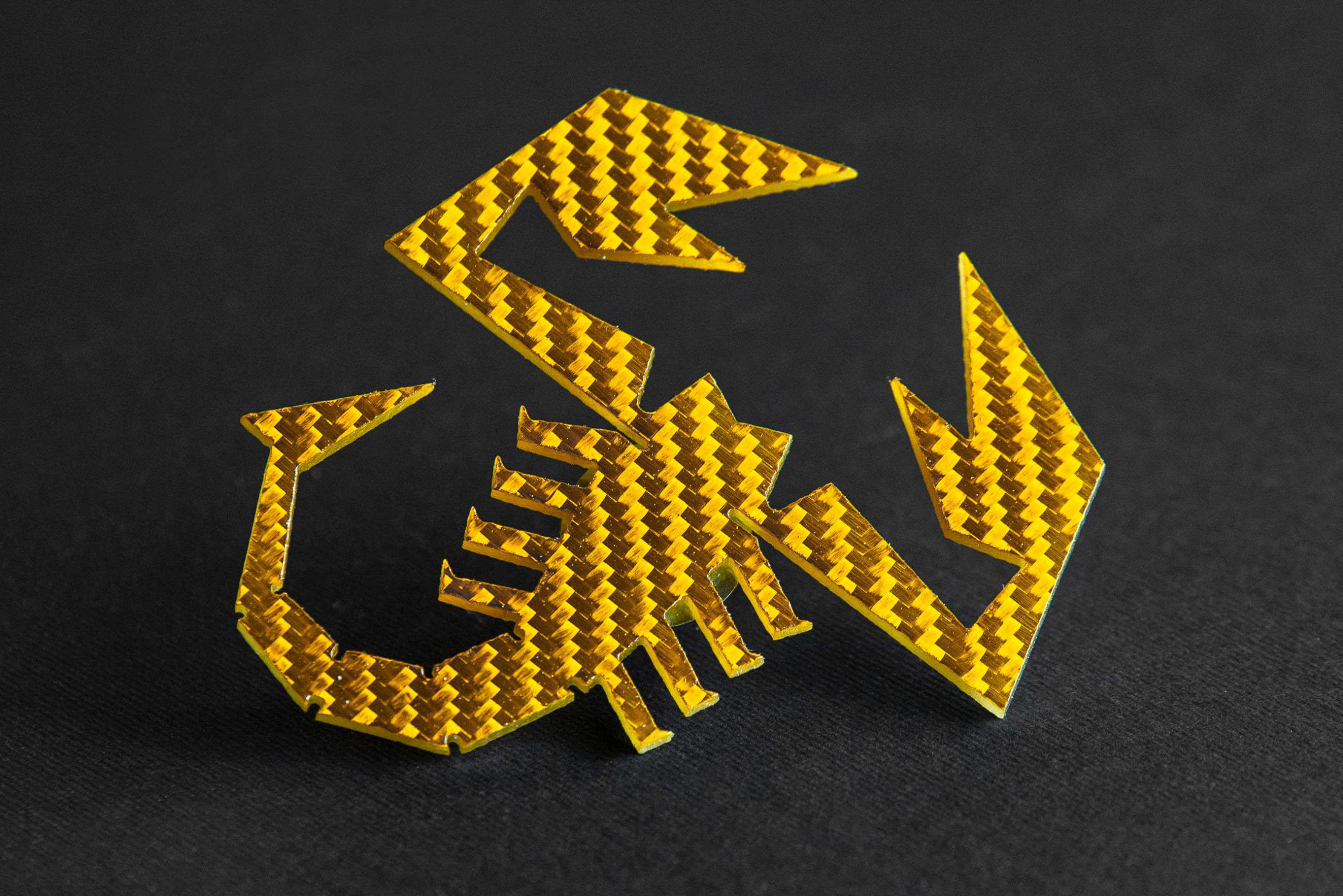 yellow abarth scorpion badge