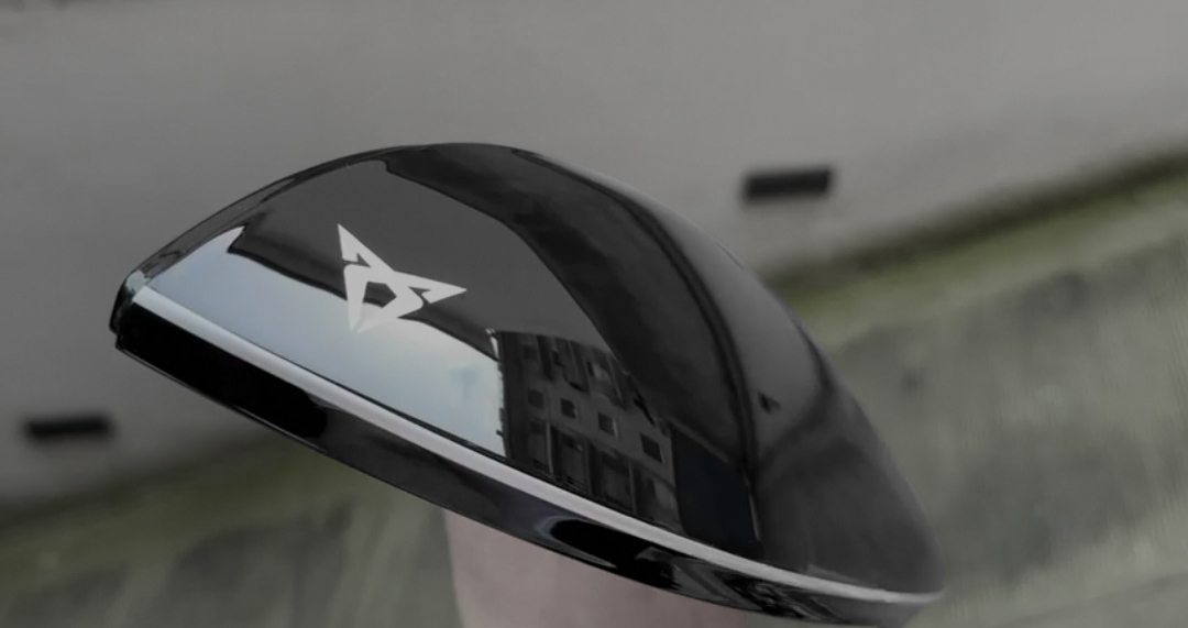 cupra born black and white mirror caps with logo 3